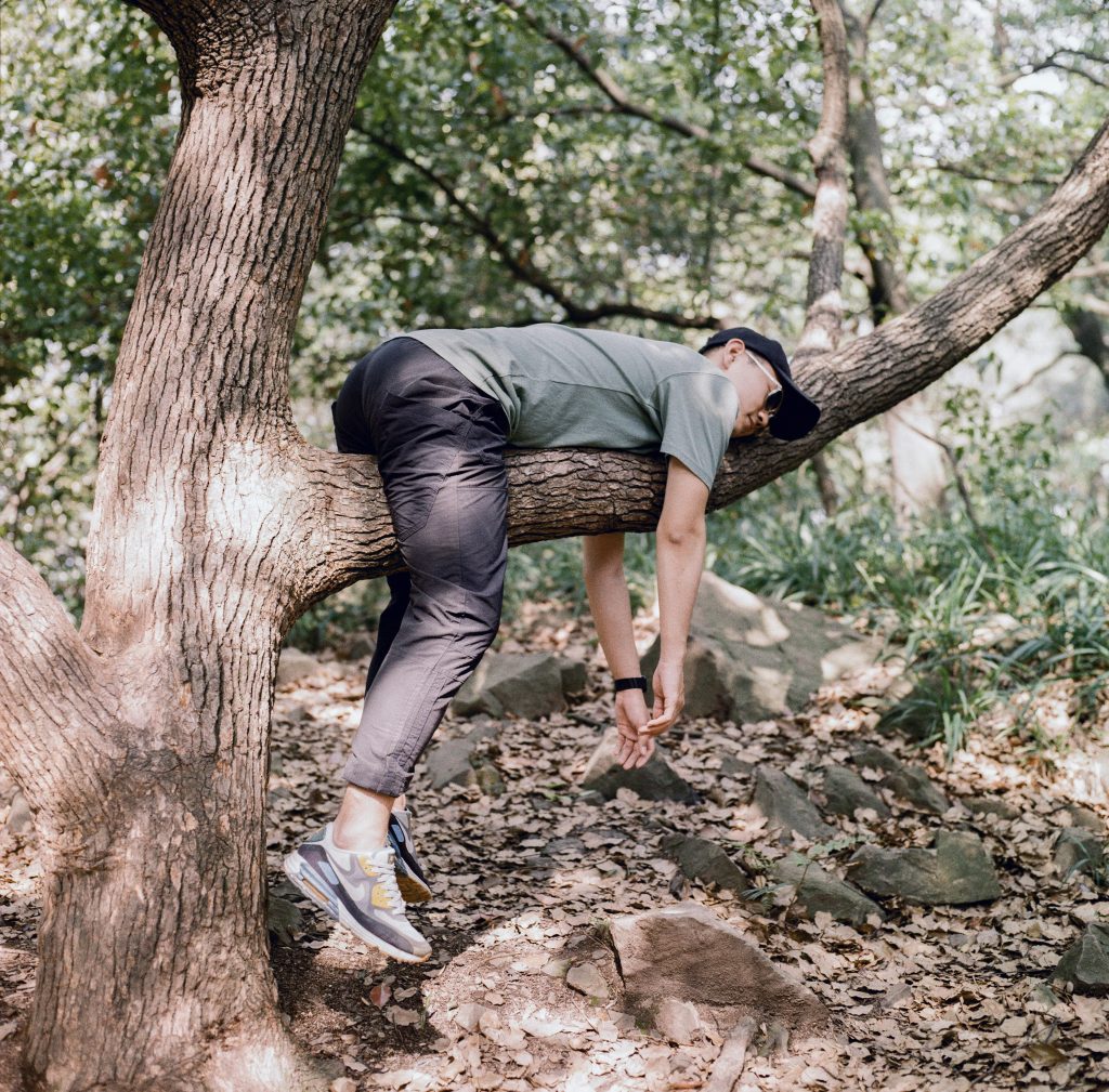 Man hanging in tree